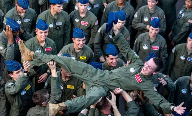 An Air Force Academy cadet crowd surfs before an NCAA college football game against Navy, Saturday, Oct. 3, 2026, at Air Force Academy, Colo. (Michael G. Seamans/The Gazette via AP)
