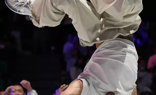 South Korea's Kim Hong-yul, known as Hongten, competes against Japan's Shigeyuki Nakarai, known as Shigekix, during the B-Boys breaking final battle at the Asian Games in Tokoname, Japan, Saturday, Oct. 3, 2026. (AP Photo/Aaron Favila)