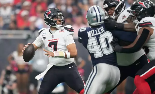 Houston Texans quarterback C.J. Stroud (7) looks to pass the ball during the first half of an NFL football game against the Dallas Cowboys in Houston, Sunday, Oct. 4, 2026. (AP Photo/Ashley Landis)
