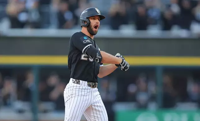 Chicago White Sox's Tristan Peters celebrates after hitting a run-scoring double against Cleveland Guardians pitcher Foster Griffin during the fourth inning in Game 3 of baseball's American League Division Series Wednesday, Oct. 7, 2026, in Chicago. (AP Photo/Melissa Tamez)