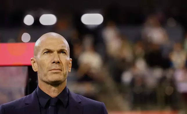 France's coach Zinedine Zidane stands before the UEFA Nations League soccer match between Belgium and France in Brussels, Belgium, Monday, Sept. 28, 2026. (AP Photo/Geert Vanden Wijngaert)