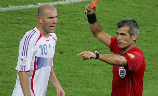 FILE - Referee Horacio Elizondo shows the red card to France's Zineidine Zidane during the final of the soccer World Cup between Italy and France in the Olympic Stadium in Berlin, on July 9, 2006. (AP Photo/Michael Probst, File)