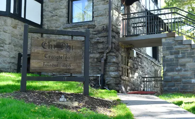 A sign stands outside the Chi Phi fraternity house at Cornell University, Monday, Oct. 5, 2026, in Ithaca, N.Y. (AP Photo/Adrian Kraus)