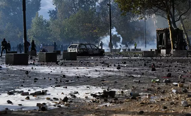 The Republique plaza during a demonstration against rising living costs and in solidarity with students’ grievances in Lyon, France, Saturday, Oct. 17, 2026. (AP Photo/Laurent Cipriani)