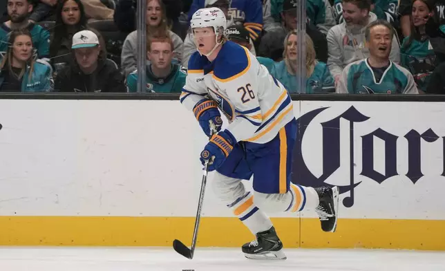 Buffalo Sabres defenseman Rasmus Dahlin (26) skates with the puck against the San Jose Sharks during the first period of an NHL hockey game, Tuesday, Oct. 27, 2026, in San Jose, Calif. (AP Photo/Jeff Chiu)