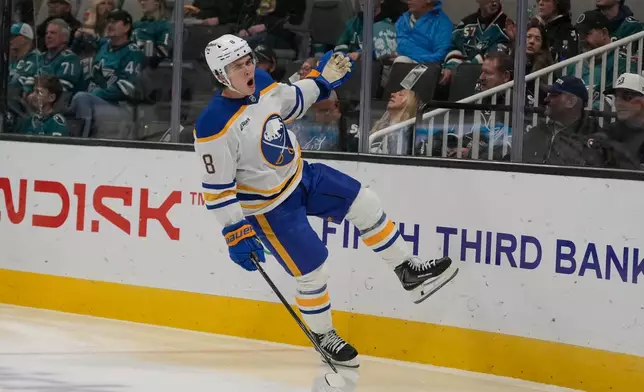 Buffalo Sabres defenseman Olen Zellweger (8) celebrates after scoring against the San Jose Sharks during the second period of an NHL hockey game, Tuesday, Oct. 27, 2026, in San Jose, Calif. (AP Photo/Jeff Chiu)