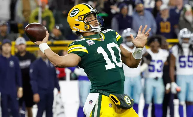 Green Bay Packers' Jordan Love throws during the first half of an NFL football game against the Dallas Cowboys in Green Bay, Wis., Sunday, Oct. 18, 2026. (AP Photo/Mike Roemer)