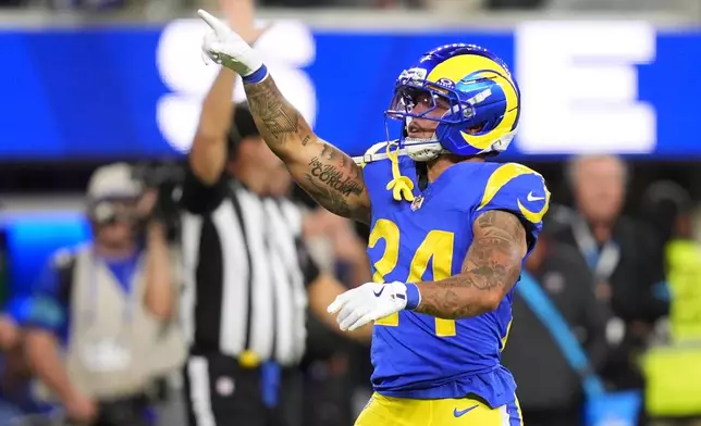 Los Angeles Rams running back Blake Corum celebrates a first down during the second half of an NFL football game against the Buffalo Bills, Monday, Oct. 12, 2026, in Inglewood, Calif. (AP Photo/Gregory Bull)