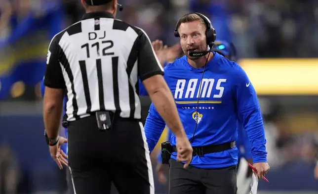 Los Angeles Rams head coach Sean McVay, right, talks with down judge Brian Sakowski during the second half of an NFL football game against the Buffalo Bills, Monday, Oct. 12, 2026, in Inglewood, Calif. (AP Photo/Scott Strazzante)