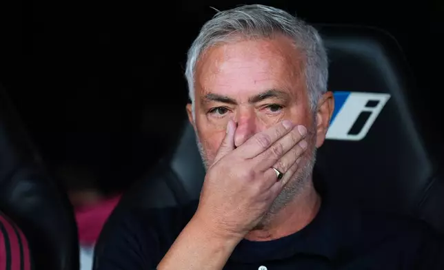 Real Madrid's head coach Jose Mourinho sits on the becnhs before the La Liga soccer match between Real Madrid and Villarreal in Madrid, Spain, Saturday, Oct. 10, 2026. (AP Photo/Manu Fernandez)