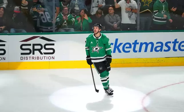 Dallas Stars right wing Mikko Rantanen looks on after scoring a goal against the Boston Bruins during the third period of an NHL hockey game Tuesday, Oct. 20, 2026, in Dallas. (AP Photo/Julio Cortez)