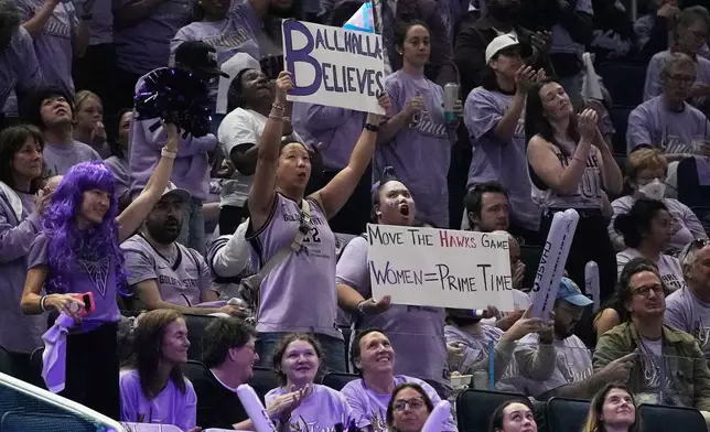 A Golden State Valkyries fan holds up a sign demanding that Game 6 of the WNBA basketball finals be shown during prime time, during Game 5 between the Valkyries and the Atlanta Dream, Monday, Oct. 26, 2026, in San Francisco. (AP Photo/Jeff Chiu)