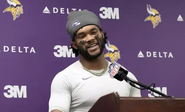 Minnesota Vikings quarterback Kyler Murray speaks at a news conference after an NFL football game against the New Orleans Saints in New Orleans, Sunday, Oct. 11, 2026. (AP Photo/Matthew Hinton)