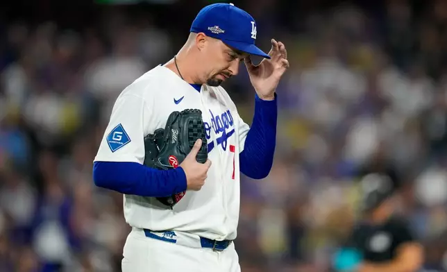 Los Angeles Dodgers pitcher Blake Snell walks off the mound during the seventh inning of Game 3 of baseball's National League Championship Series between the Milwaukee Brewers and the Los Angeles Dodgers, Wednesday, Oct. 14, 2026, in Los Angeles. (AP Photo/Ashley Landis)
