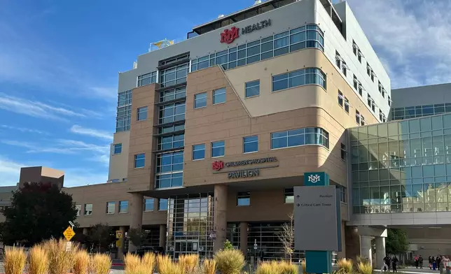 This photo taken with a smartphone shows the University of New Mexico Health System on Monday, Oct. 26, 2026, in Albuquerque, N.M. (AP Photo/Christopher Keller)