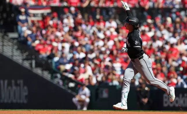 Chicago White Sox's Munetaka Murakami runs the bases after hitting a two-run home run against the Cleveland Guardians during the fourth inning in Game 1 of baseball's American League Division Series, Saturday, Oct. 3, 2026, in Cleveland. (AP Photo/Tim Phillis)