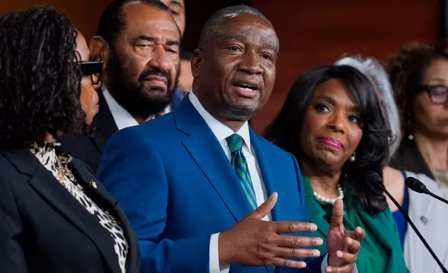 FILE - Rep. Cleo Fields, D-La., center, who represents Louisiana's 6th congressional district, is joined by members of the Congressional Black Caucus as they speak to reporters at the Capitol in Washington, April 29, 2026. (AP Photo/J. Scott Applewhite, file)