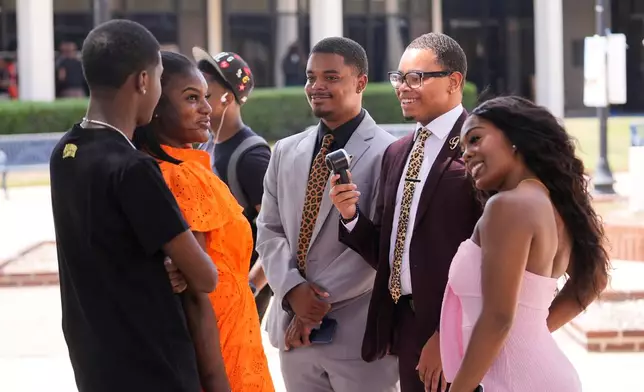 Southern University students participate in the traditional Pretty Wednesday on campus during lunch time in the Scotlandville section of Baton Rouge, La., Wednesday, Sept. 16, 2026. (AP Photo/Gerald Herbert)