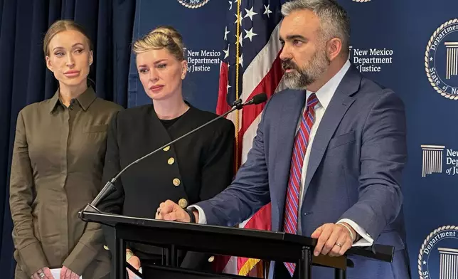 Julia Molchanova, left, Anouska De Georgiou, center, and New Mexico Attorney General Raúl Torrez speak at a news conference where Torrez announced a lawsuit against the co-executors of Jeffrey Epstein's estate, Wednesday, Oct. 21, 2026, in Albuquerque, N.M. (AP Photo/Susan Montoya Bryan)