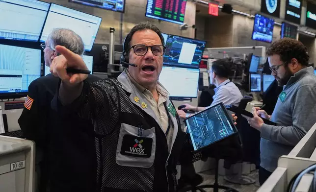 FILE - Options trader Anthony Spina works on the floor of the New York Stock Exchange, Wednesday, Jan. 7, 2026. (AP Photo/Richard Drew, File)