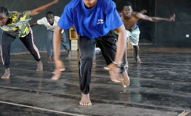 Members of The Fientan Compagnie, a group of young deaf and non-speaking people, take part in a dance training, in Bobo-Dioulasso, Burkina Faso, Tuesday, May 5, 2026. (AP Photo/Elia Borras)