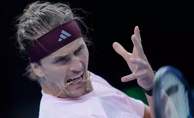 Alexander Zverev, of Germany, returns a ball to Novak Djokovic, of Serbia, during the men's singles quarterfinals match at the China Open tennis tournament in Beijing, Sunday, Oct. 4, 2026. (AP Photo/Achmad Ibrahim)