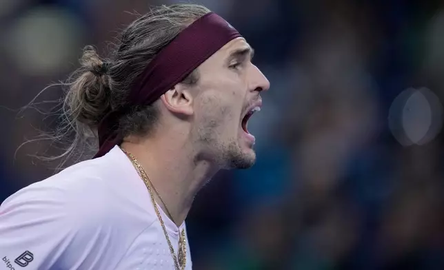 Alexander Zverev, of Germany, reacts during the men's singles quarterfinals match against Novak Djokovic, of Serbia, at the China Open tennis tournament in Beijing, Sunday, Oct. 4, 2026. (AP Photo/Achmad Ibrahim)