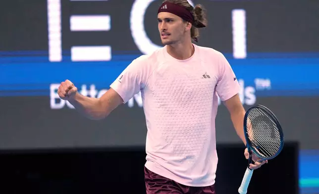 Alexander Zverev of Germany celebrates his victory against Cameron Norrie of Britain during their men's singles match at the China Open tennis tournament in Beijing, Thursday, Oct. 1, 2026. (AP Photo/Achmad Ibrahim)
