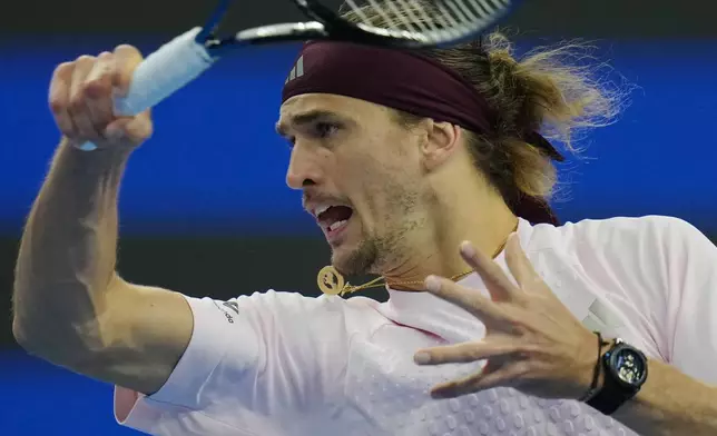 Alexander Zverev, of Germany, returns a ball to Shang Juncheng, of China, during the second round of the men's singles match at the China Open tennis tournament in Beijing, Saturday, Oct. 3, 2026. (AP Photo/Ng Han Guan)