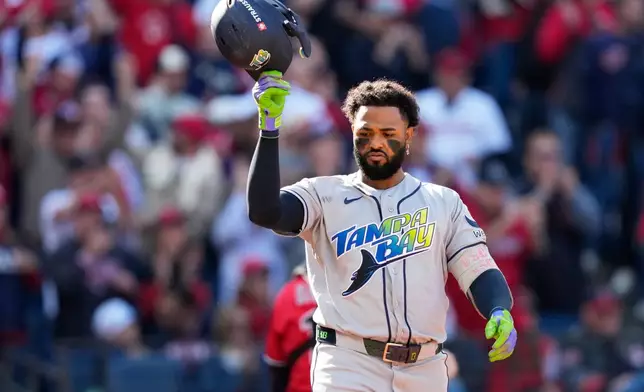 Tampa Bay Rays' Junior Caminero reacts after striking out against the Cleveland Guardians during the sixth inning in Game 3 of an American League Championship Series baseball game in Cleveland, Thursday, Oct. 15, 2026. (AP Photo/David J. Phillip)