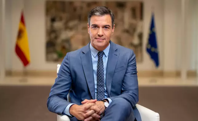 FILE - Spain's Prime Minister Pedro Sanchez poses for a portrait after an interview with The Associated Press at the Moncloa Palace in Madrid, Spain, June 27, 2022. (AP Photo/Bernat Armangue, File)