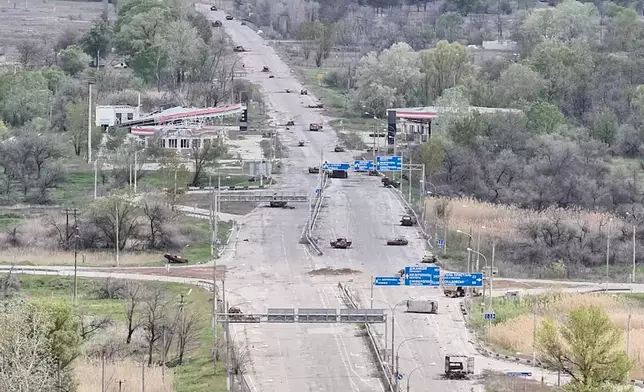 In this undated image from video provided by the Ukrainian 34th Separate Marine Brigade "Borysfen" on Sept. 30, 2026, destroyed cars are seen on a highway from the Russian-occupied city of Oleshky in the Kherson region of Ukraine. (Ukrainian 34th Separate Marine Brigade "Borysfen" via AP)