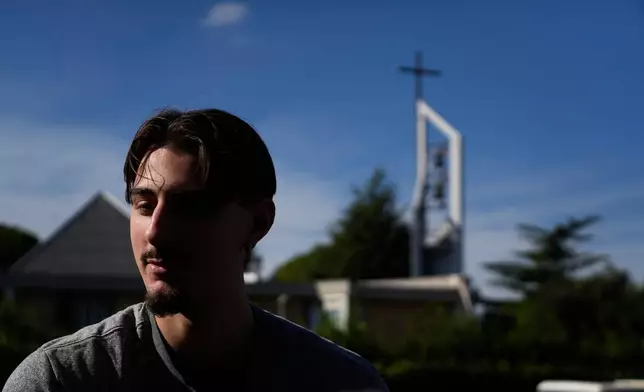 Villanova basketball team's Luigi Suigo talks to journalists prior to the start of the men's basketball team training session in Rome, Thursday, Oct. 29, 2026. (AP Photo/Gregorio Borgia)
