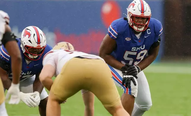 SMU Mustangs offensive lineman PJ Williams (59) prepares for the snap during an NCAA college football game against Boston College, Saturday, Oct. 3, 2026, in Dallas. (AP Photo/Gareth Patterson)