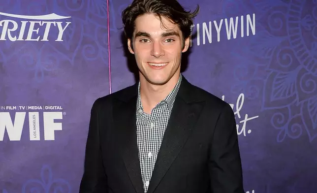 FILE - RJ Mitte arrives at the Variety and Women in Film's pre-Emmy celebration on Aug. 23, 2014, at Gracias Madre in West Hollywood, Calif. (Photo by Evan Agostini/Invision/AP, File)
