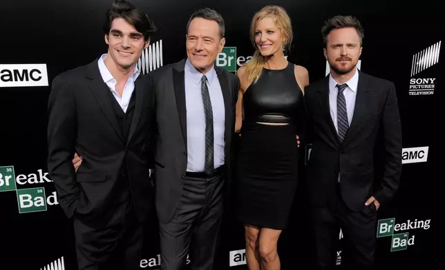 FILE - "Breaking Bad" cast members RJ Mitte, from left, Bryan Cranston, Anna Gunn and Aaron Paul pose at a premiere screening to celebrate the final episodes of the television series at Sony Pictures Studios on July 24, 2013 in Los Angeles. (Photo by Chris Pizzello/Invision/AP)