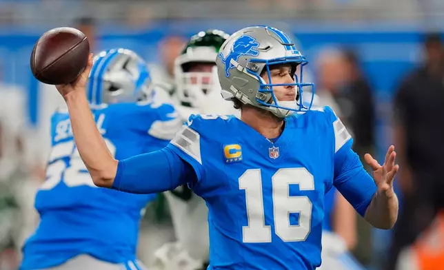 Detroit Lions' Jared Goff throws during the first half of an NFL football game against the New York Jets in Detroit, Sunday, Sept. 27, 2026. (AP Photo/Paul Sancya)
