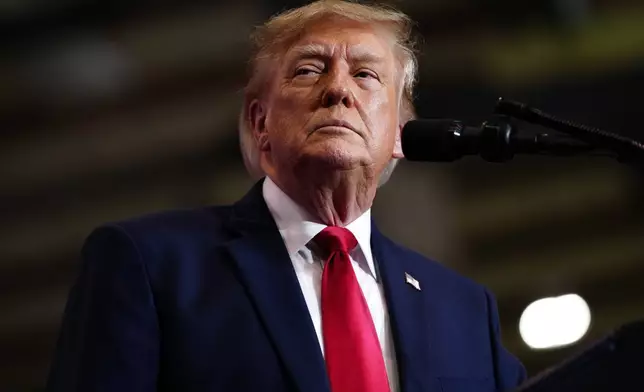 President Donald Trump speaks at a campaign rally at the T. Ed Garrison Arena, Wednesday, Oct. 21, 2026, in Pendleton, S.C. (AP Photo/Julia Demaree Nikhinson)