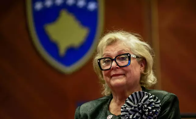 Newly elected Kosovo President Justina Shiroka Pula is seen after she was elected in Kosovo's capital Pristina on Tuesday, Oct. 6, 2026. (AP Photo/Visar Kryeziu)