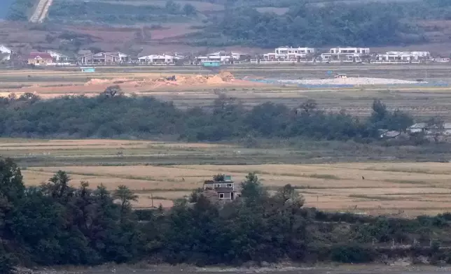 A North Korean military guard post is seen from the Peace Observation Post near the border with North Korea, in Gwanghwa, South Korea, Thursday, Oct. 15, 2026. (AP Photo/Ahn Young-joon)