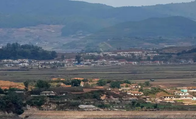 North Korea's Kaepoong village is seen from the Peace Observation Post near the border with North Korea, in Gwanghwa, South Korea, Thursday, Oct. 15, 2026. (AP Photo/Ahn Young-joon)