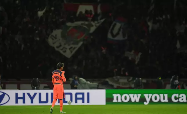 Barcelona's Lamine Yamal gestures end of the Champions League opening phase soccer match between Paris Saint-Germain and FC Barcelona in Paris, Tuesday, Oct. 20, 2026. (AP Photo/Thibault Camus)