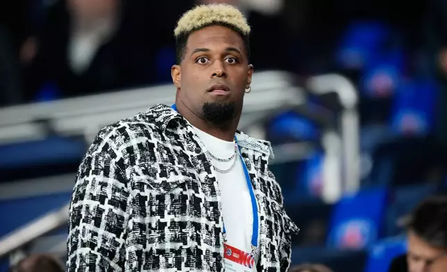 New Orleans Saints' Cameron Jordan attends the Champions League opening phase soccer match between Paris Saint-Germain and FC Barcelona in Paris, Tuesday, Oct. 20, 2026. (AP Photo/Teresa Suarez)