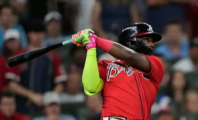 Atlanta Braves' Michael Harris II hits a three-run home run against the Philadelphia Phillies in the first inning during Game 3 of baseball's NL Wild Card Series, Thursday, Oct. 1, 2026, in Atlanta. (AP Photo/Brynn Anderson)