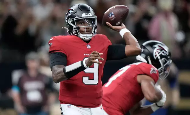 Atlanta Falcons quarterback Michael Penix Jr. (9) passes against the New Orleans Saints during the first half of an NFL football game in New Orleans, Monday, Oct. 5, 2026. (AP Photo/Gerald Herbert)