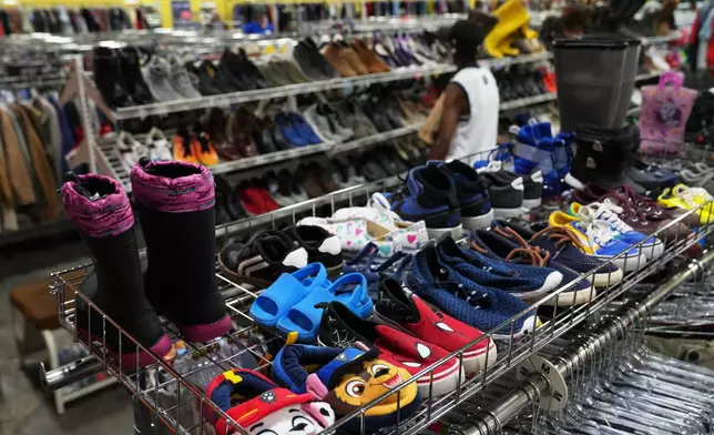 FILE - The children's shoe section is seen at a Goodwill store in Roseville, Minn., Aug. 12, 2026. (AP Photo/Ellen Schmidt, File)