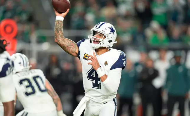 Dallas Cowboys quarterback Dak Prescott (4) throws during the second half of an NFL football game against the Philadelphia Eagles in Philadelphia, Monday, Oct. 26, 2026. (AP Photo/Chris Szagola)