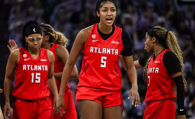 Atlanta Dream forward Angel Reese (5) reacts during the first half of Game 2 of the WNBA basketball finals against the Golden State Valkyries, Monday, Oct. 19, 2026, in San Francisco. (AP Photo/Justine Willard)
