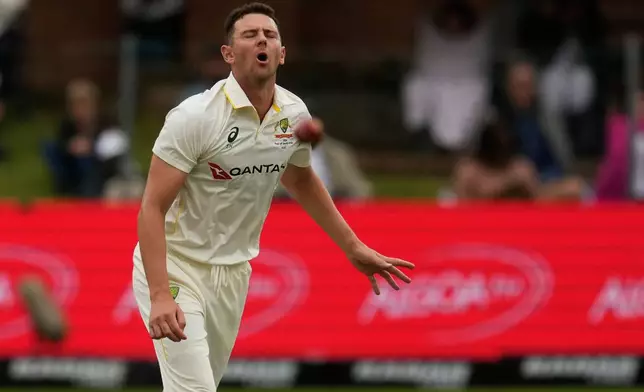 Australia's Josh Hazlewood reacts after bowling on day one of the second cricket test match between South Africa and Australia, in Gqeberha, South Africa, Sunday, Oct. 18, 2026. (AP Photo/ Themba Hadebe)