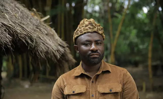 Mwami Alphonse Bin Kitobi, chief of the Bapakombe-Bakondo village, poses for a portrait in the Beni Territory of North Kivu, eastern Congo, Saturday, Oct. 24, 2026. (AP Photo/Sebastien Kitsa Musayi)